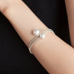 Load image into Gallery viewer, SO SEOUL Quinn Elegance - White or Pink Pearl Double Row Austrian Crystal Adjustable Spiral Bangle