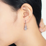 Load image into Gallery viewer, SO SEOUL Callista Twisted Infinite Diamond Simulant Hoop Earrings