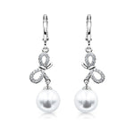 Load image into Gallery viewer, SO SEOUL Graceful Ribbon Bow with Pearl Dangle Solitaire Diamond Simulant Cubic Zirconia Left/Right Hoop Earrings