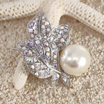 Load image into Gallery viewer, SO SEOUL Leilani Flower with Oversized Pearl Aurore Boreale Austrian Crystal Rollover Clasp Brooch