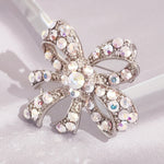 Load image into Gallery viewer, SO SEOUL Lifelong Oversized Ribbon Bow Aurore Boreale Crystal Rollover Clasp Brooch