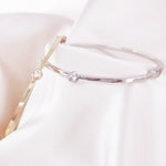 Load image into Gallery viewer, SO SEOUL Athena Round Solitaire Brilliant Cut Bezel Diamond Simulant Cubic Zircon Side Hinged Bangle