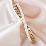 Load image into Gallery viewer, SO SEOUL Roman Numeral Intertwine Double Row Insets Austrian Crystal Rose Gold Side Hinged Bangle