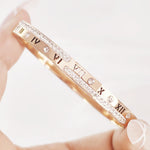 Load image into Gallery viewer, SO SEOUL Valeria Roman Numeral Zig Zag Austrian Crystal Rose Gold Side Hinged Bangle