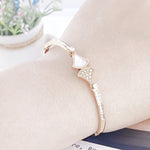 Load image into Gallery viewer, SO SEOUL Harper Wavy Fan Insets Mother of Pearl Austrian Crystal Rose Gold Bangle