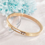 Load image into Gallery viewer, SO SEOUL Aurelia Triple Rolling Diamond Simulant Cubic Zirconia Rose Gold Side Hinged Bangle