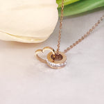 Load image into Gallery viewer, SO SEOUL Aurelia Barrel Love Interlocking Diamond Simulant Cubic Zirconia Rose Gold Pendant Necklace