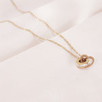 Load image into Gallery viewer, SO SEOUL Aurelia Barrel Love Interlocking Diamond Simulant Cubic Zirconia Rose Gold Pendant Necklace