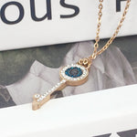 Load image into Gallery viewer, SO SEOUL Infinite Love Key Tied Knot White/Montana Austrian Crystal Rose Gold Fixed Chain Necklace