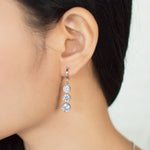 Load image into Gallery viewer, SO SEOUL Lila Crown Triple Round Diamond Simulant Zirconia Necklace and Hoop Earrings Set
