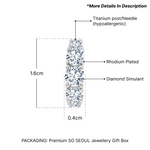 Load image into Gallery viewer, SO SEOUL Five-Stone Cubic Zirconia Huggie Hoop Earrings