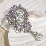 Load image into Gallery viewer, SO SEOUL Quinn Pearl in White Dangles Aurore Boreale Crystal Rollover Clasp Brooch
