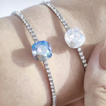 Load image into Gallery viewer, SO SEOUL Carina Cushion Moonlight/Light Sapphire Shimmer Swarovski® Crystal Spiral Open-End Bangle
