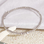 Load image into Gallery viewer, SO SEOUL Chiara Classic Emerald Single Row Austrian Crystal Circle Spiral Adjustable Open-End Bangle
