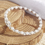 Load image into Gallery viewer, SO SEOUL Quinn Pearl in White Classic Single Row Austrian Crystal Spiral Adjustable Open-End Bangle