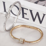 Load image into Gallery viewer, SO SEOUL Aurelia Rolling Barrel White Austrian Crystal Middle Screw Clasp Hinged Rose Gold Bangle
