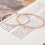 Load image into Gallery viewer, SO SEOUL Athena Round Solitaire Brilliant Cut Bezel Diamond Simulant Cubic Zircon Side Hinged Bangle
