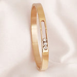 Load image into Gallery viewer, SO SEOUL Aurelia Triple Rolling Diamond Simulant Cubic Zirconia Rose Gold Side Hinged Bangle
