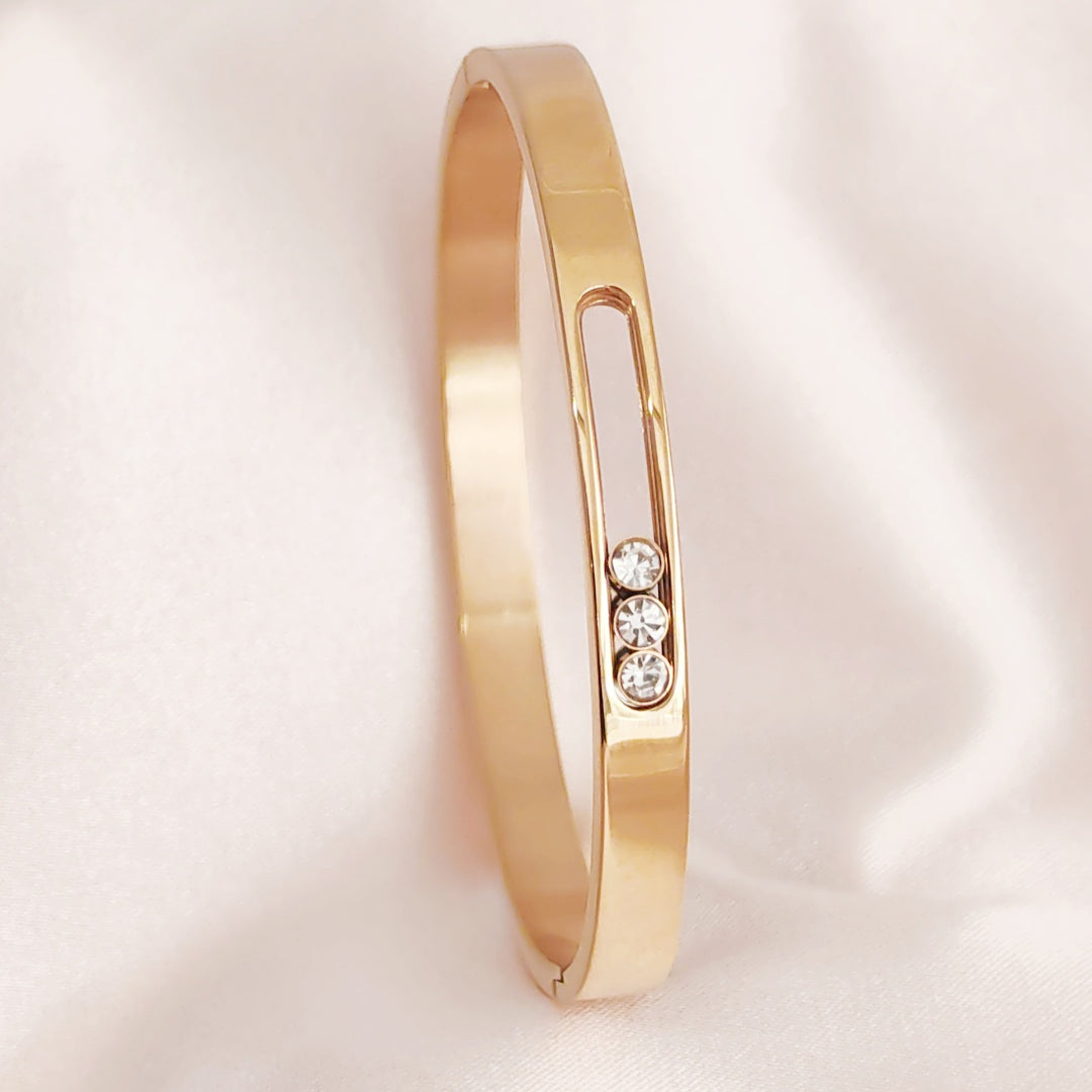 SO SEOUL Aurelia Triple Rolling Diamond Simulant Cubic Zirconia Rose Gold Side Hinged Bangle