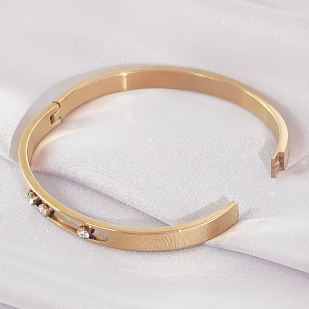 SO SEOUL Aurelia Triple Rolling Diamond Simulant Cubic Zirconia Rose Gold Side Hinged Bangle