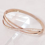 Load image into Gallery viewer, SO SEOUL Harper Twist Intertwined Insets White Austrian Crystal Rose Gold Side Hinged Bangle
