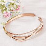 Load image into Gallery viewer, SO SEOUL Harper Twist Intertwined Insets White Austrian Crystal Rose Gold Side Hinged Bangle