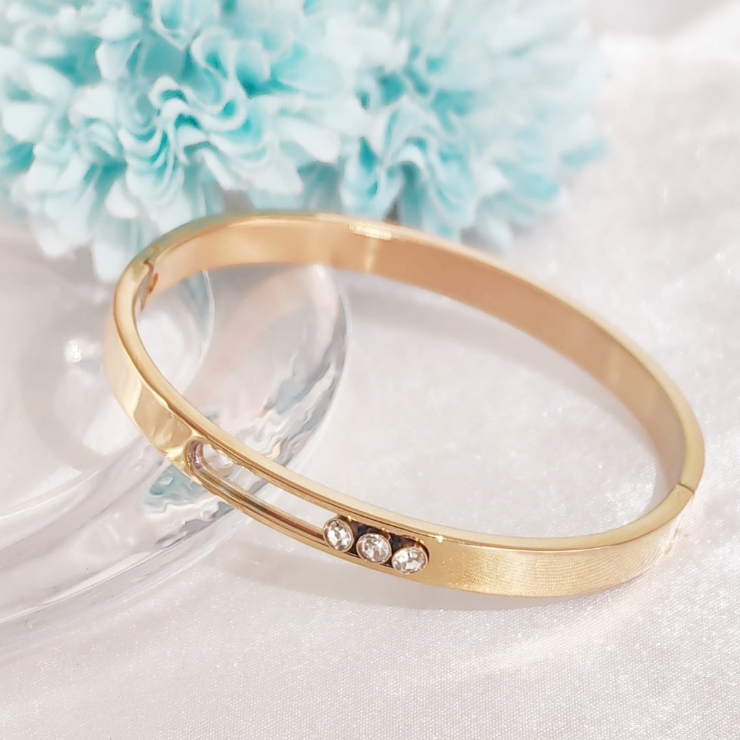 SO SEOUL Aurelia Triple Rolling Diamond Simulant Cubic Zirconia Rose Gold Side Hinged Bangle