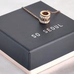 Load image into Gallery viewer, SO SEOUL Roman Numeral Rolling Barrel Diamond Simulant Cubic Zirconia Rose Gold Pendant Necklace