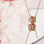 Load image into Gallery viewer, SO SEOUL Roman Numeral Rolling Barrel Austrian Crystal Rose Gold Pendant Necklace