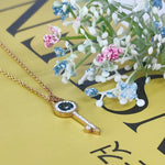 Load image into Gallery viewer, SO SEOUL Infinite Love Key Tied Knot White/Montana Austrian Crystal Rose Gold Fixed Chain Necklace