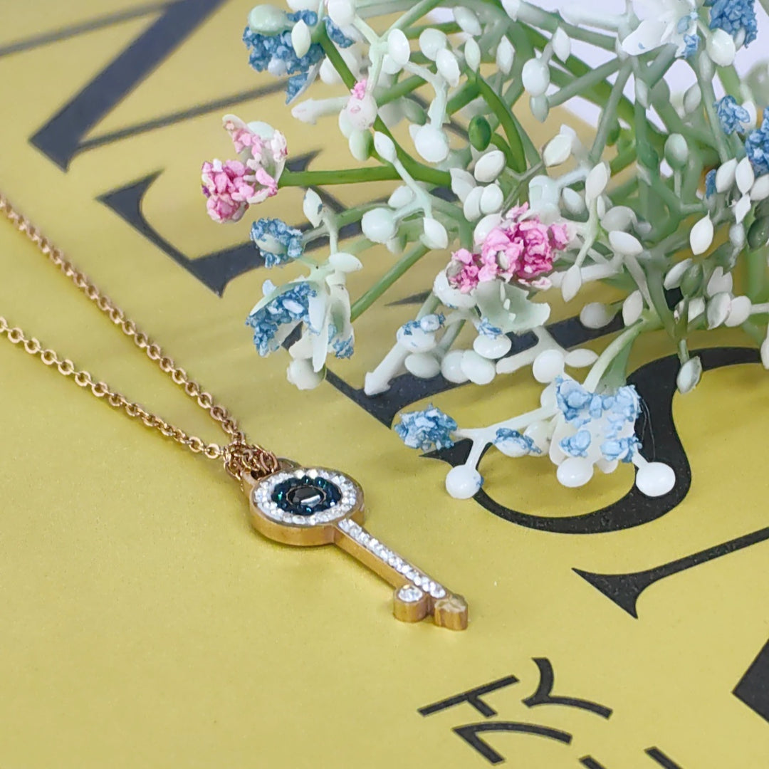 SO SEOUL Infinite Love Key Tied Knot White/Montana Austrian Crystal Rose Gold Fixed Chain Necklace